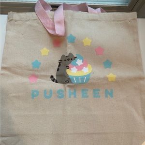 Pusheen with cupcake ten year anniversary canvas tote bag